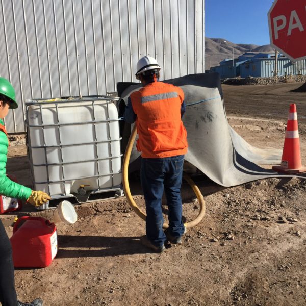 male worker holding a huge hose