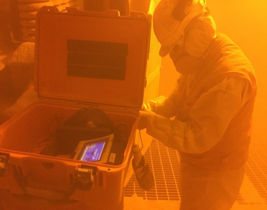 man working with a gas mask