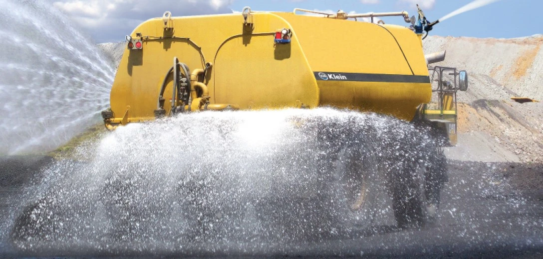 Yellow truck irrigating